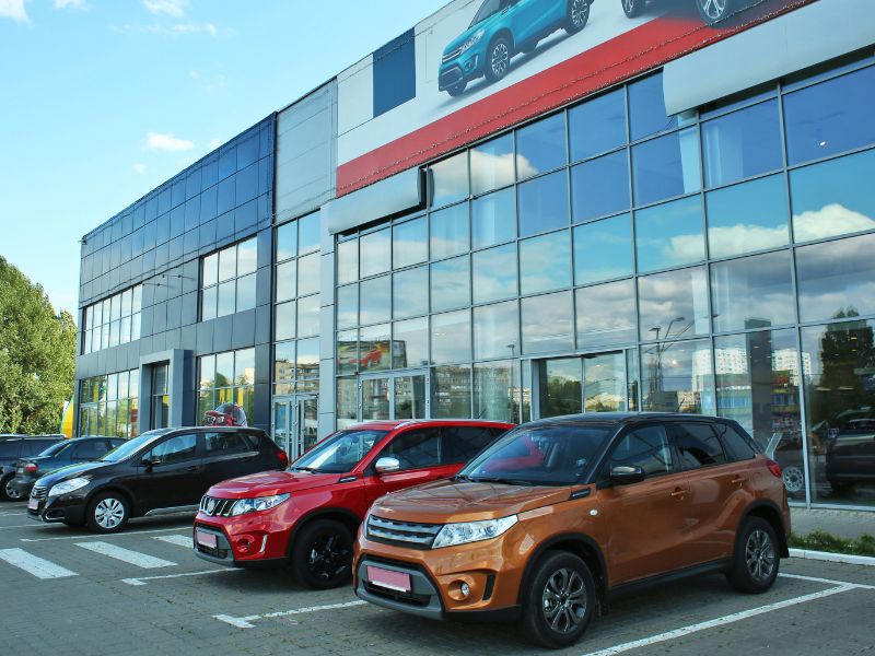 Cars parked in lot – corporate fleet shipping solutions